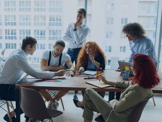 Employees around a table