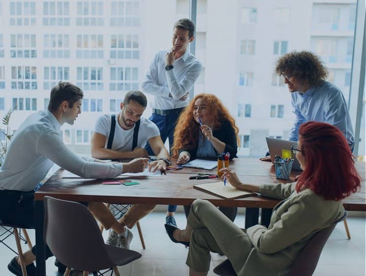 Employees Around Table